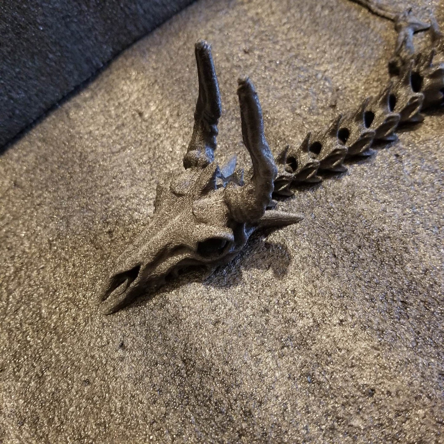 Articulated Dragon Skeleton 24i nch Black Carbon Fiber Infused fidget flexi designed by @doll_maker_spb